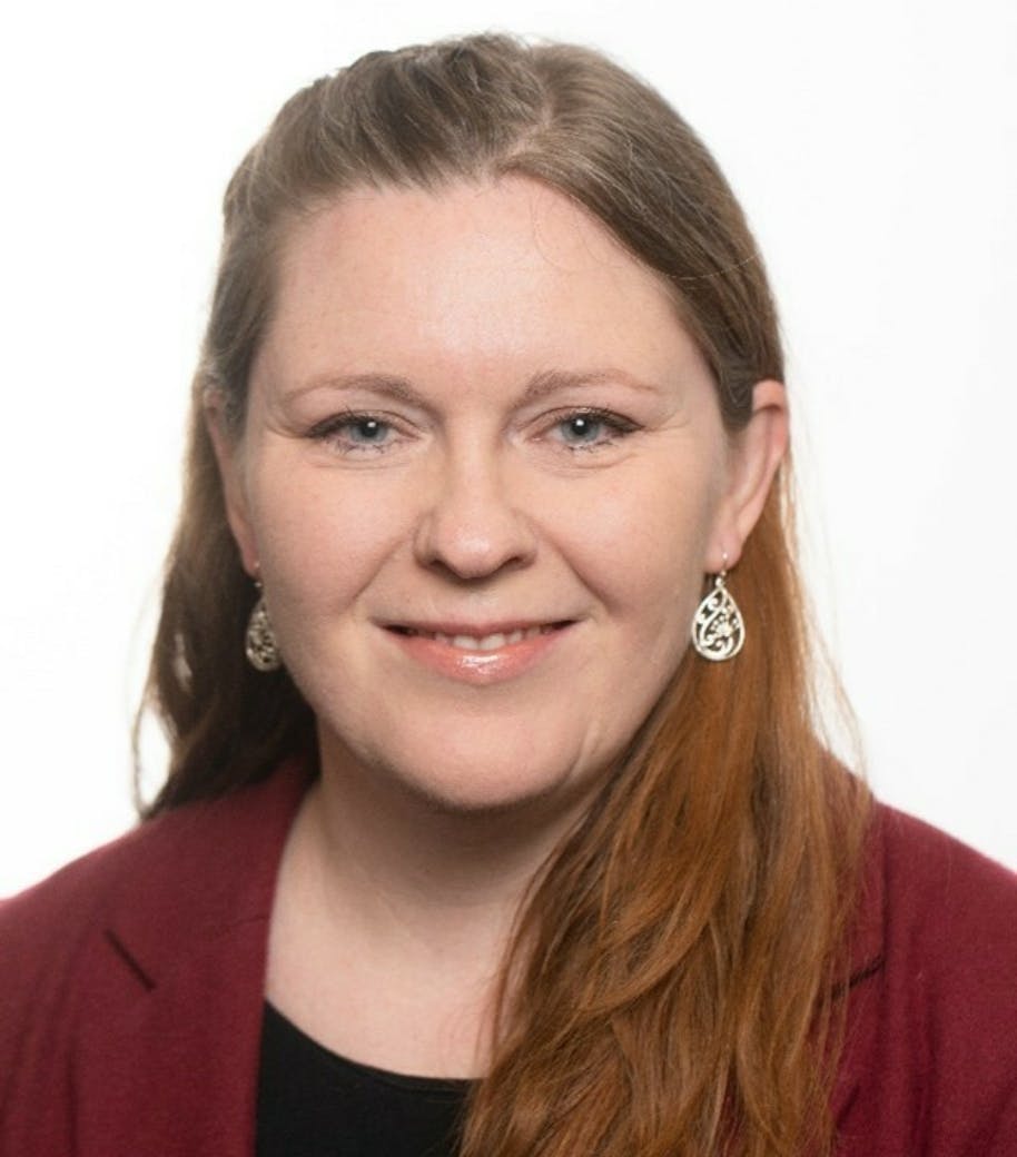 Dr Melanie Coker